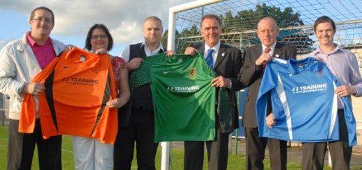 Representatives from Main Sponsor JJ Training with GNE chairman Dave Atkinson unveil the new shirts for 2012-14