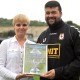 GNE and Goalkeeper Greg Hall receive their August awards