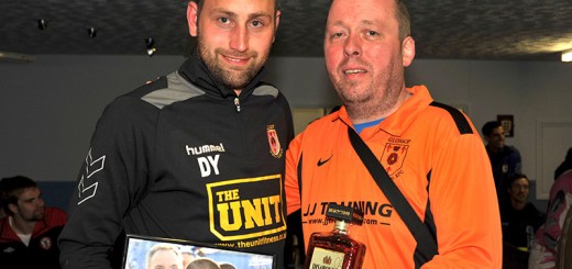 Dave Young collects the Glossop North End Supporters Club Player Of the month awards for March