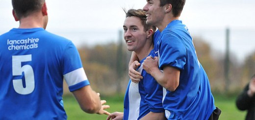 The Lugsden Twins celebrate scoring at West Didsbury & Chorlton