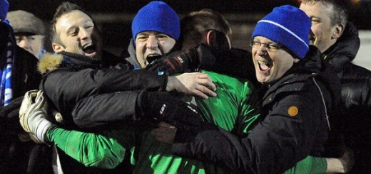 Glossop North End's Greg Hall celebrates with supporters after victory over Workstop Town