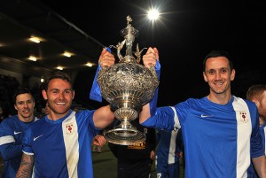 NWCFL League Cup Trophy Held By Martin Parker and Michael Bowler of Glossop North End