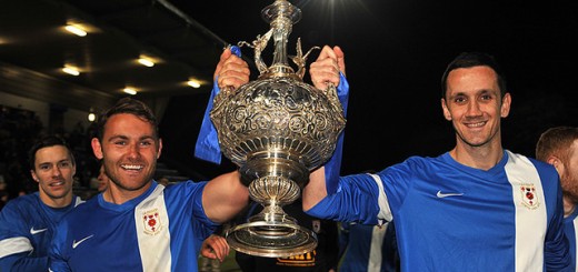 NWCFL League Cup Trophy Held By Martin Parker and Michael Bowler of Glossop North End
